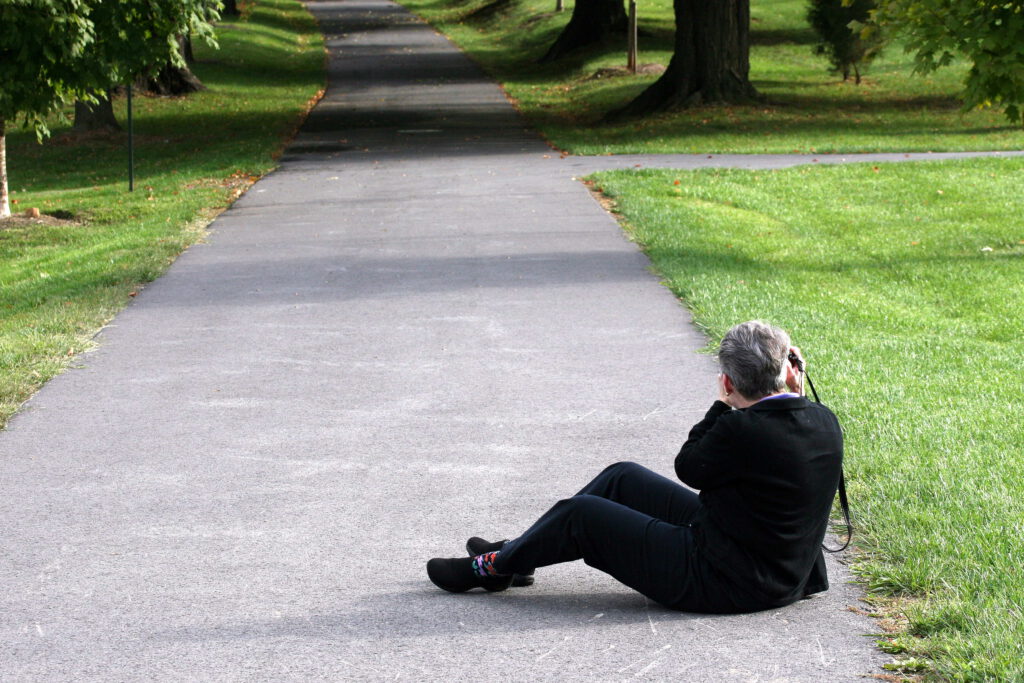 Fotograaf op de grond hoort bij blog
